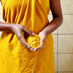 바디팩으로 피부결 개선 방법 - Turmeric & Gram Flour Body Pack**

A woman with perfect anatomy applying a turmeric and gram flour (...